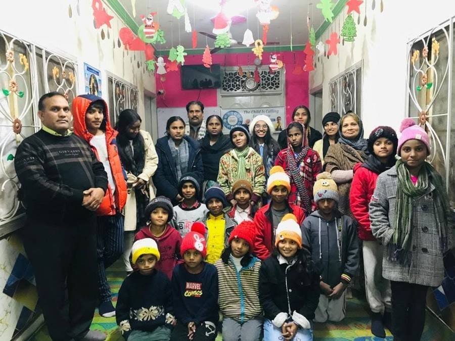 Children and CLF team members together